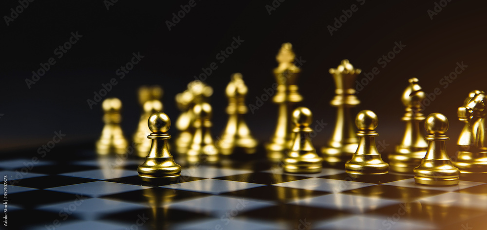 Golden chess that came out of the line Concept of business Strategic plan professional teamwork and management. Golden chess that came out of the line Concept of business Strategic plan professional teamwork and management.