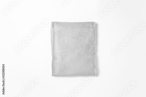 White folded towel isolated on white background. Bath towel.High-resolution photo.Top view.