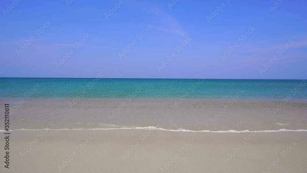Beautiful seascape with white sand and wave at tropical beach Beautiful seascape with white sand and wave at tropical beach