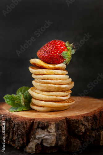 Wallpaper Mural Trendy food during coronavirus Covid-19 lockdown quarantine - tiny pancakes. Poffertjes, Little Dutch pancakes. Breakfast for kids, mini pancakes. Torontodigital.ca