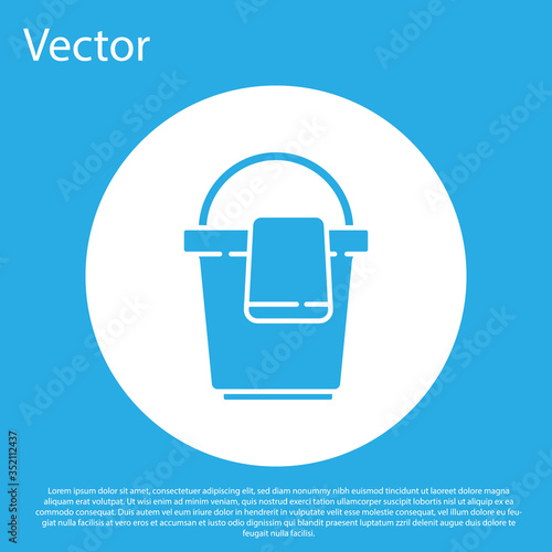 Blue Bucket with rag icon isolated on blue background. Cleaning service concept. White circle button. Vector