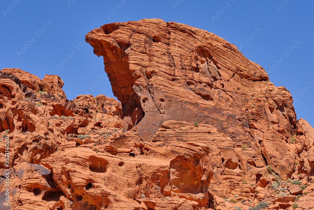 Colorful Aztec sandstone formations in the Nevada Desert caused by millions of years of erosion