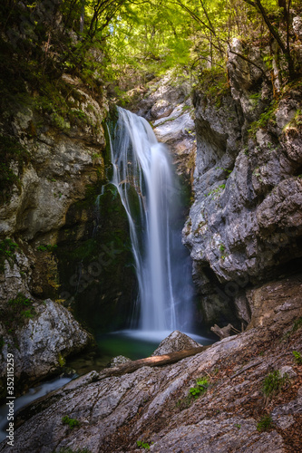 Beautiful Sum or Mostnica waterfall on the end of Voje valley in Slovenia