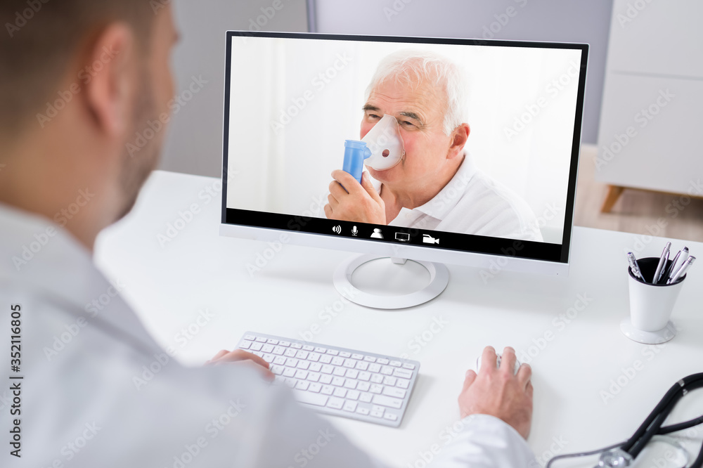 Doctor Video Conferencing On Laptop