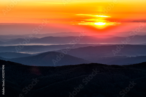 Fototapeta Naklejka Na Ścianę i Meble -  Wonderful sunrise in the mountains. A view from the Polonina Carynska. Bieszczady National Park. Carpathians. Poland.