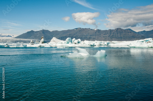 scenic view over lagoon with iceberg