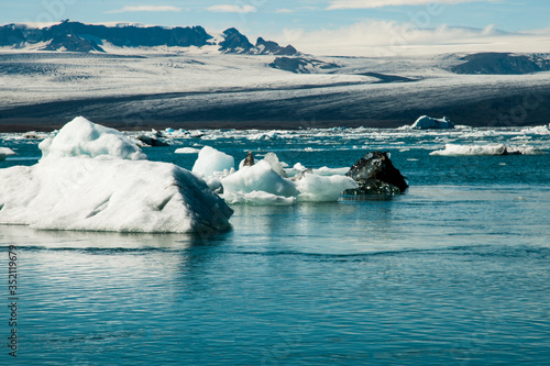scenic view over lagoon with iceberg