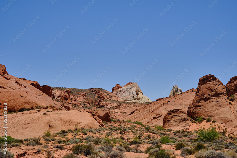 Red Aztec Sandstone and other rock formations in the Nevada Desert