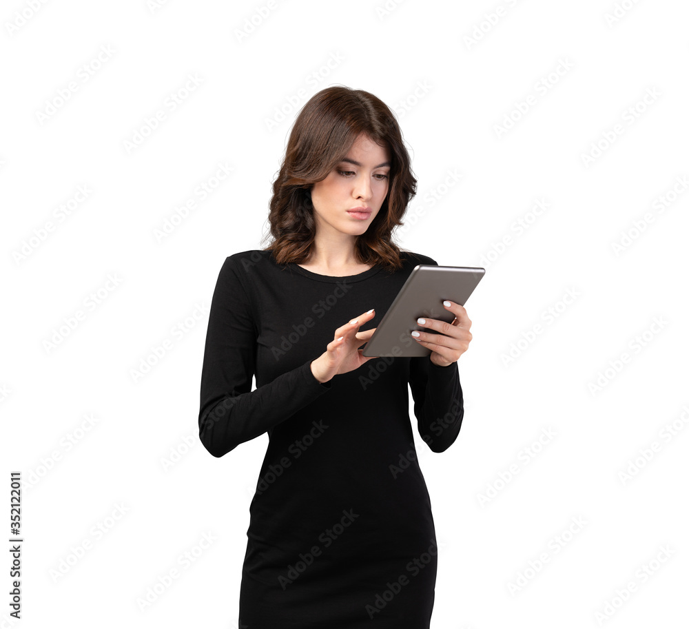 Businesswoman in dress using tablet, isolated Businesswoman in dress using tablet, isolated