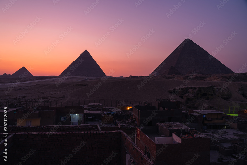 Great Pyramids of Giza on top of Giza plateau in a beautiful sunset, Giza, Cairo, Lower Egypt