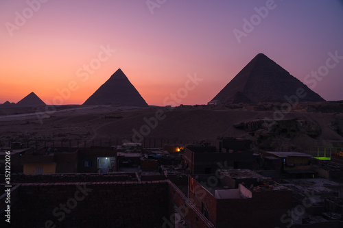 Great Pyramids of Giza on top of Giza plateau in a beautiful sunset  Giza  Cairo  Lower Egypt
