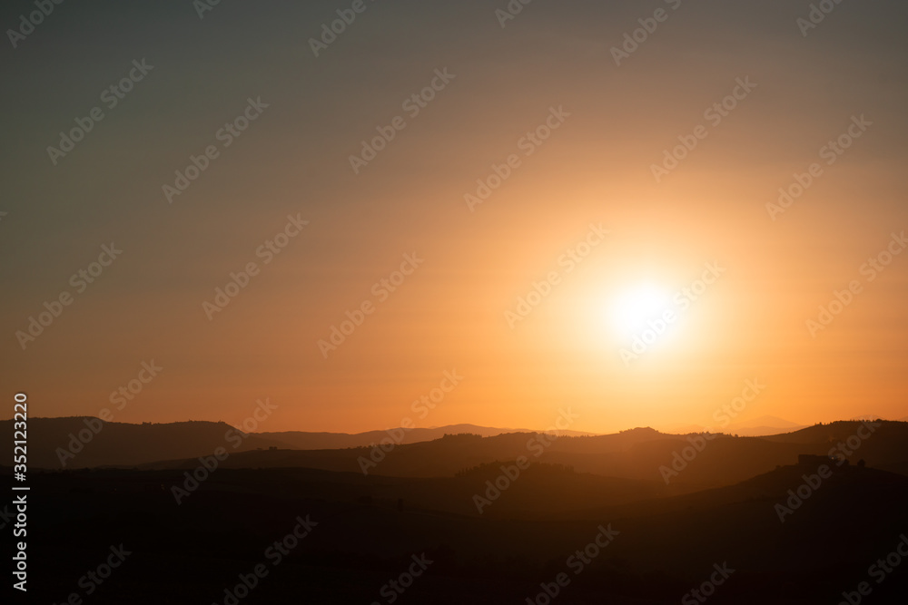 Amazing lanscape Tuscany at sun set, Italy, summer outdoor. Hills and evening sun