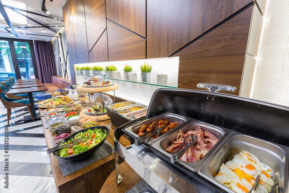Buffet breakfast table in modern hotel