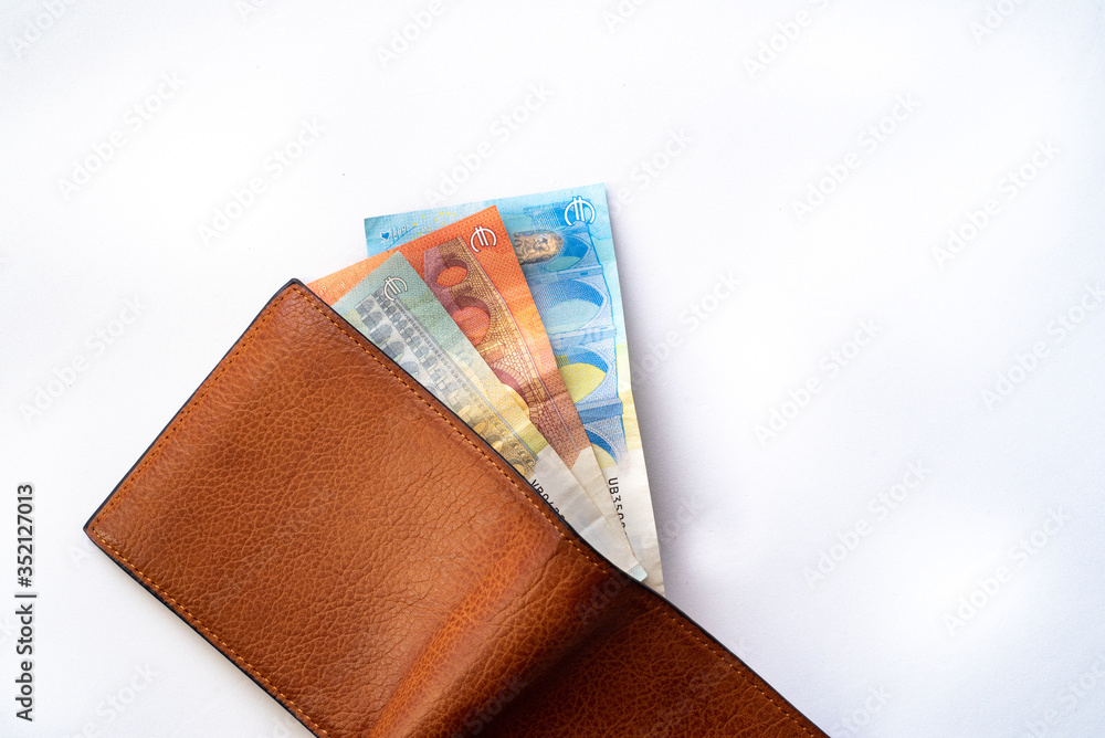 European Banknotes in a open wallet. Wallet with money on a white background.
