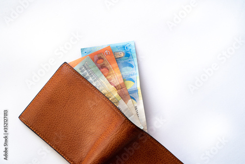 Obraz na płótnie European Banknotes in a open wallet. Wallet with money on a white background. w salonie