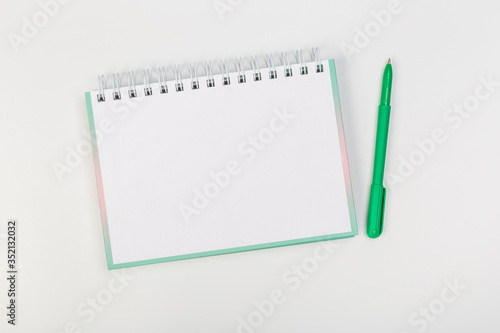 school ring binder notebook with pen isolated on white background