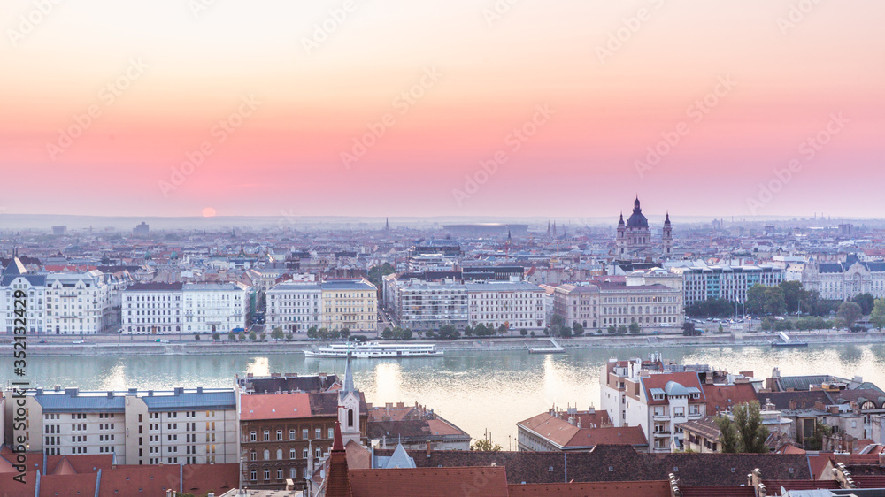 Panoramic cityscape of Saint Stephen basilica on the Danube river. Colorful sunrise in Budapest, Hungary