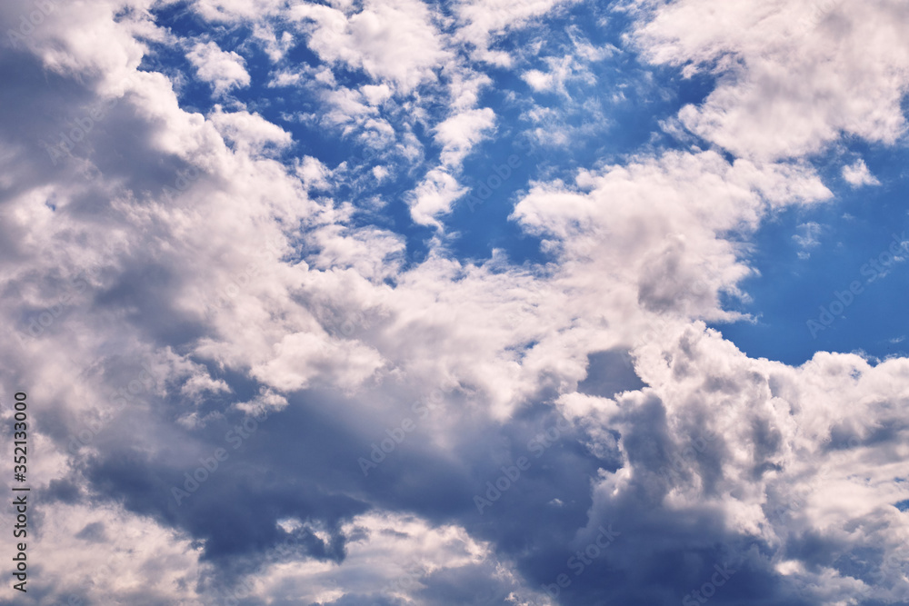 Blue sky with white clouds. Sky texture..