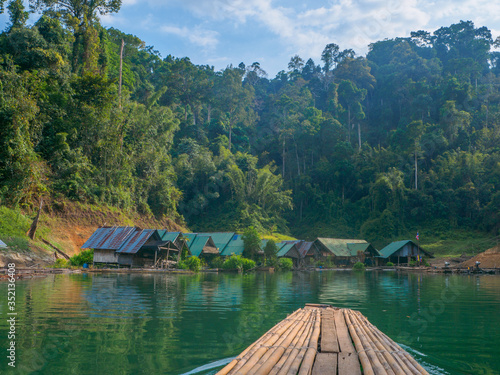 Local raft houses in a lake © Mayumi.K.Photography