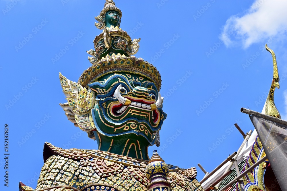 The statue at Wat Phra Kaew. The statue at Wat Phra Kaew.