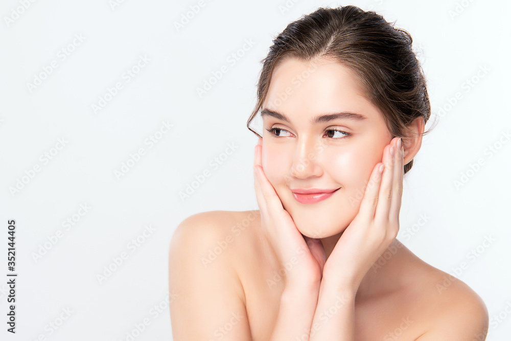 Beautiful Young Woman touching her clean face with fresh Healthy Skin, isolated on white background, Beauty Cosmetics and Facial treatment Concept.