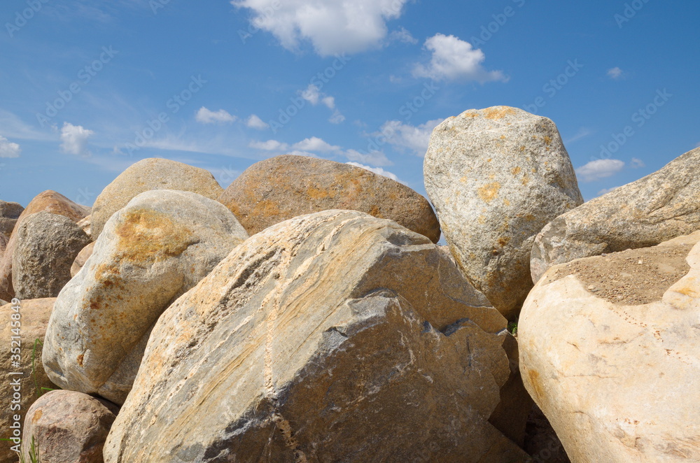 Large boulders against the blue sky
