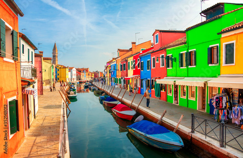 Colorful houses in Burano island near Venice, Italy. Canals and streets of Burano.