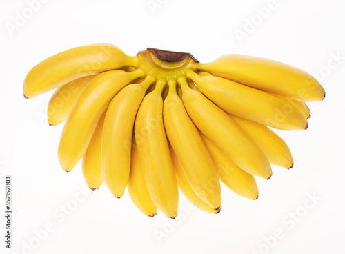 Yellow bananas on the white background. © KONSTANTIN