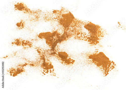 pile cinnamon powder isolated on white background, with top view