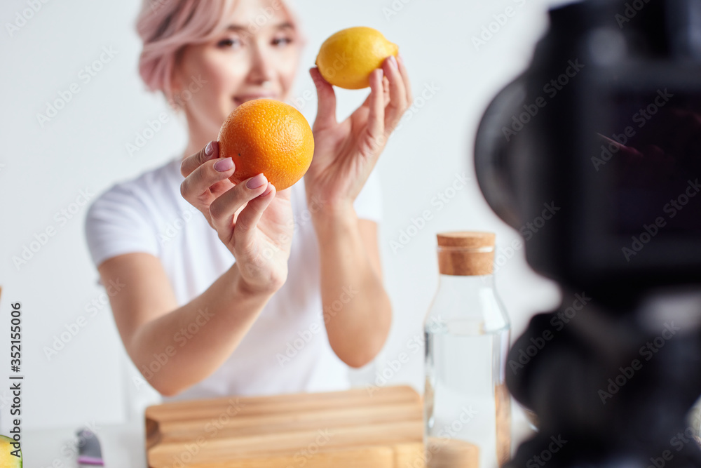 Woman holding fresh fruits in ahnds Woman holding fresh fruits in ahnds