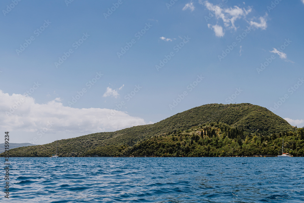 Small uninhabited tropical island in the ocean. Small uninhabited tropical island in the ocean.