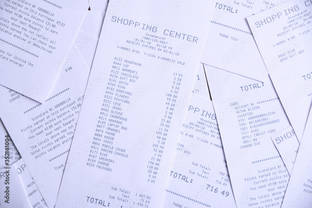 Background from checks from purchases from shops. Close up Background from checks from purchases from shops. Close up