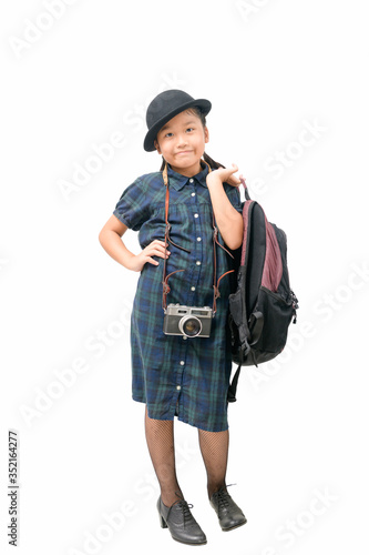 Cute traveler wear hats and a backpack with vintage camera isolated.
