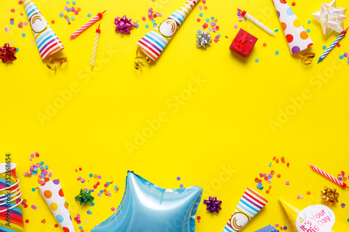 flatout Birthday party card on a yellow background with copy space for text