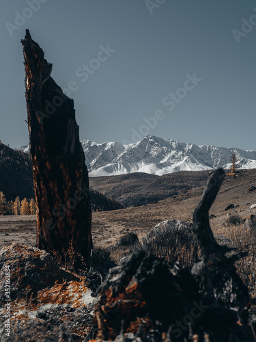 Snowy ridge mountains. Altai mountains. Autumn