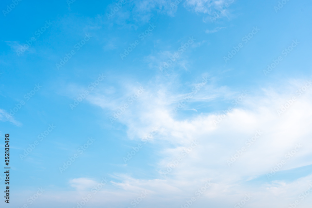 Blue sky and white clouds background on daytime