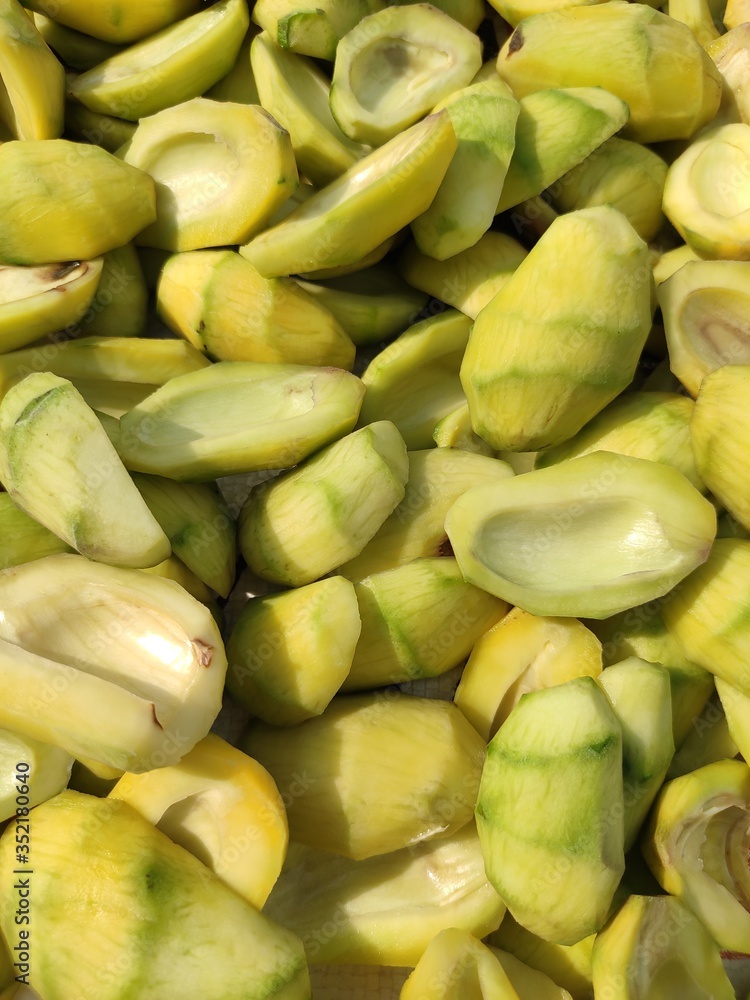 part of Bengali seasonal fruit,the unripened mango, it's seed, it's slices and pieces are arranged. Used as spice during cooking vegetables as aamchoor powder. part of Bengali seasonal fruit,the unripened mango, it's seed, it's slices and pieces are arranged. Used as spice during cooking vegetables as aamchoor powder.