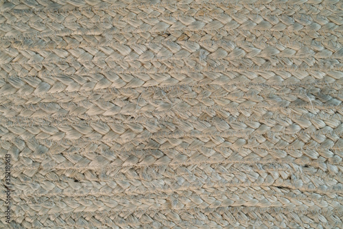 pale jute floor rag background closeup