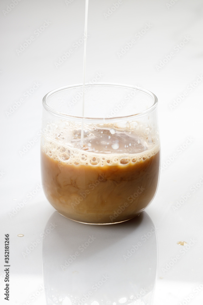 cup of hot coffee on white marble table background. cup of hot coffee on white marble table background.