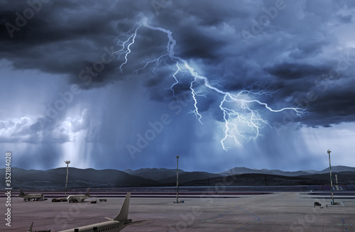 Quadro su tela bad weather and storm with lightning bolt at airport