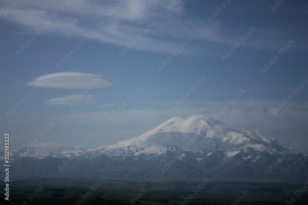 Lenticular clouds over mount Elbrus