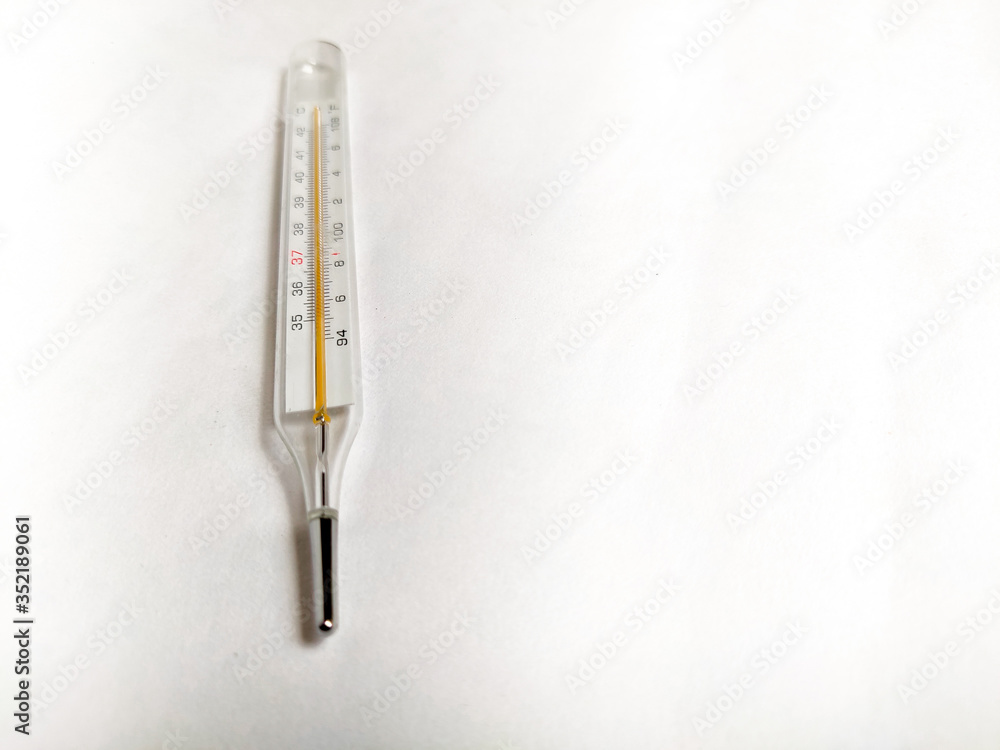 Analog glass thermometer isolated on white background Analog glass thermometer isolated on white background