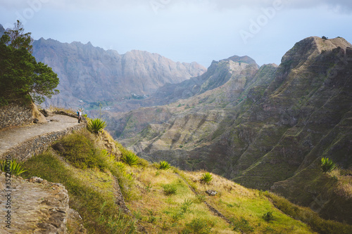 Santo Antao Island Cape Verde. Female tourist on hike enjoying view to Caculi valley from Corda