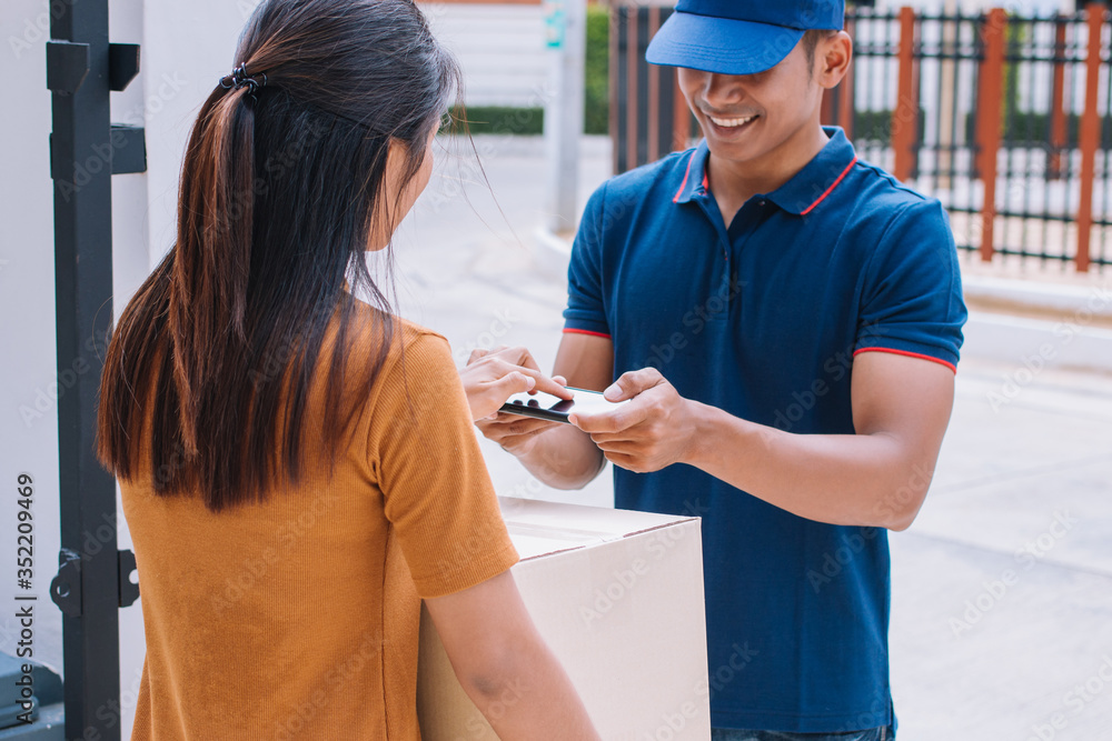 custom made wallpaper toronto digitalFast service commerce delivery concept. Deliveryman sent parcel package box for customer, Received parcel box from shopping online