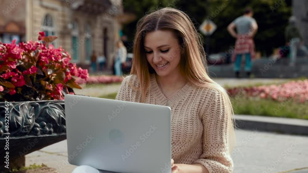 Woman work on laptop at park Woman work on laptop at park