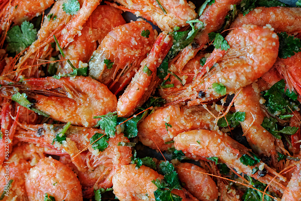 Fresh boiled prawns with coriander. A delicious dish of seafood. Fresh boiled prawns with coriander. A delicious dish of seafood.