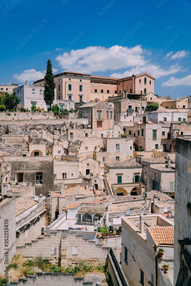 View of the narrow streets of the ancient city of Matera on a sunny day. Italy.