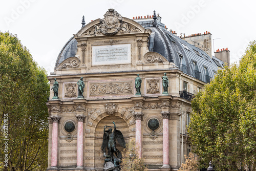 Fontaine Saint-Michel,  by the architect Gabriel Davioud, a monumental fountain located in Place Saint-Michel in the 6th arrondissement in Paris, France. photo