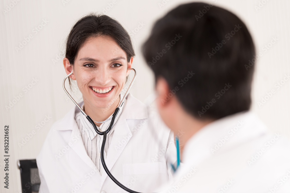 Two doctors have working together with happiness in the hospital. Two doctors have working together with happiness in the hospital.