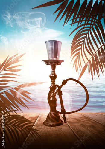 Oriental Hookah on a wooden...